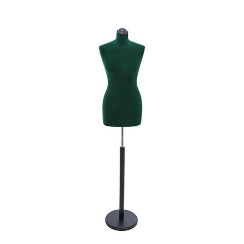 Female tailor bust in green velvet with round black base
