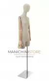 Busto donna in lino con testa stilizzata, mezza gamba, braccia legno e base cromata