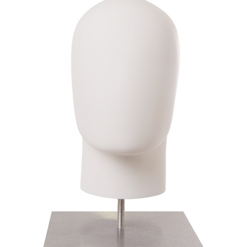 Female display head in linen with black base