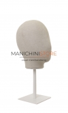Female display head in linen with white base